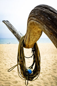 Close-up of rope on beach