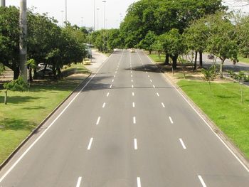 Road passing through forest