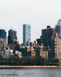 New york cityscape consisting of new and old buildings, creating multiple layers.