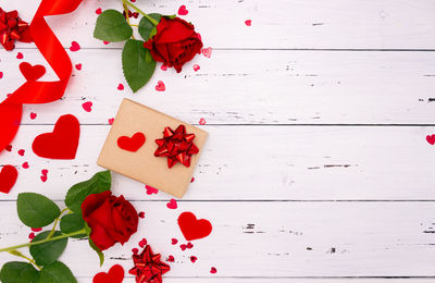High angle view of red roses on table