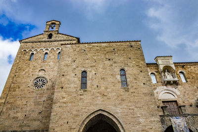 Low angle view of old building against sky