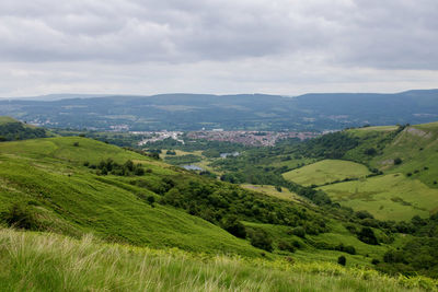 Scenic view of brecon beacons against cloudy sky