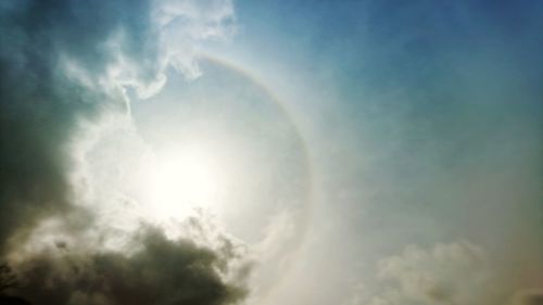 Low angle view of rainbow in sky