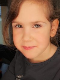 Close-up portrait of smiling girl