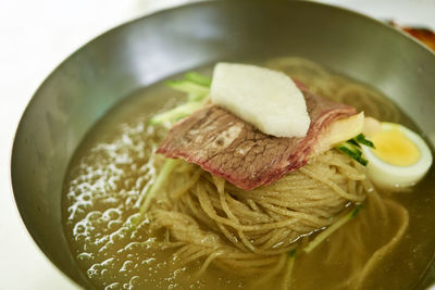 Close-up of naengmyeon served in bowl