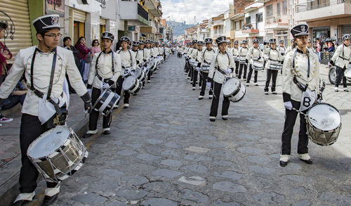 Group of people on street in city