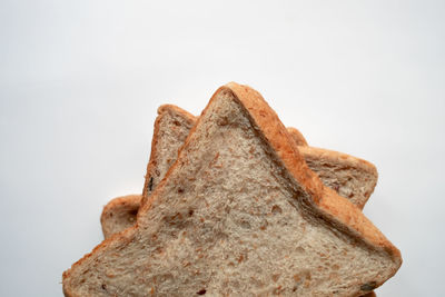 Close-up of rock against white background