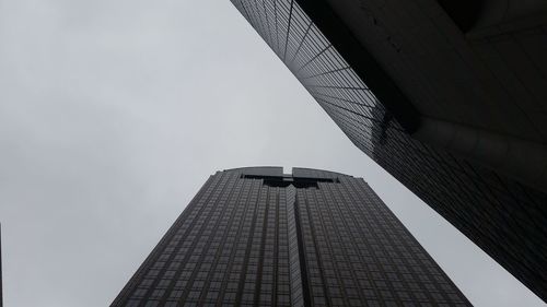 Low angle view of skyscrapers against sky