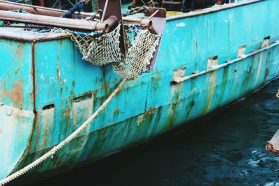 Boat moored in water