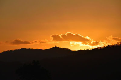 Scenic view of dramatic sky during sunset