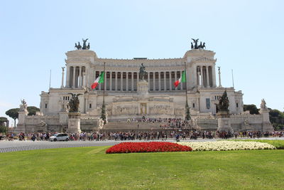 Group of people in front of historical building