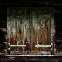 Old wooden door of building