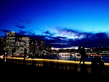 Illuminated cityscape at night