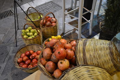 High angle view of fruits in wicker baskets at market