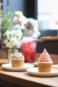 Close-up of cupcakes on table