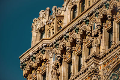 Low angle view of historic building against sky