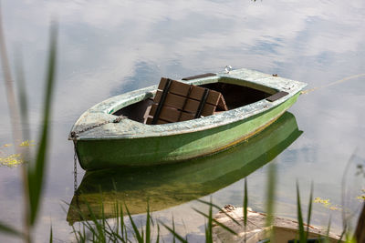 High angle view of boat moored in lake