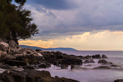 Scenic view of sea against sky during sunset