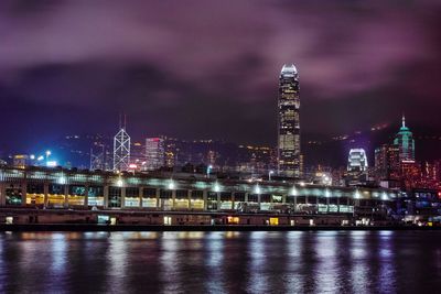 Illuminated city at waterfront