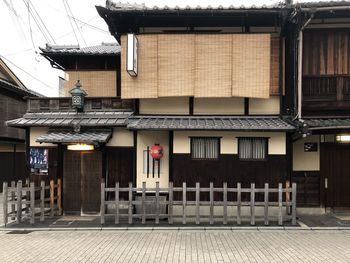 Exterior of house by street in city