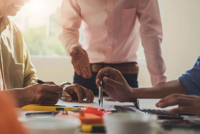 Businessmen working at desk in office