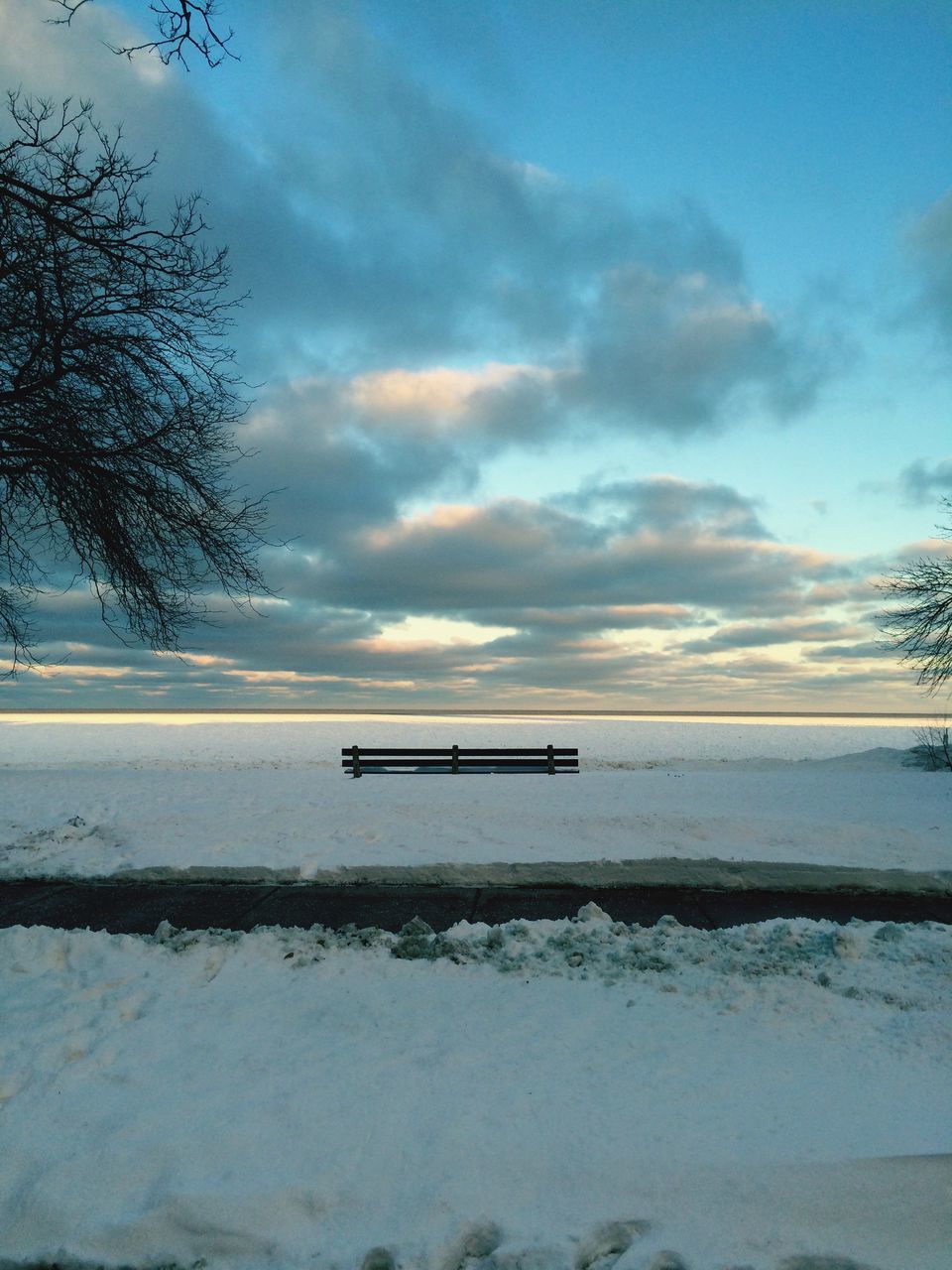 snow, winter, cold temperature, sky, tranquility, tranquil scene, weather, cloud - sky, sunset, scenics, beauty in nature, nature, season, tree, frozen, water, covering, cloud, cloudy, landscape