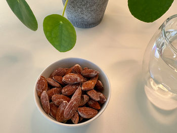Close-up of almonds in glass