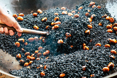 Close-up of person preparing food