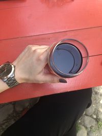 Close-up of hand holding drink