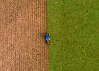 High angle view of tractor on agricultural field