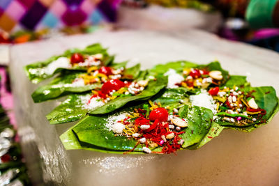 Close-up of fresh vegetables in plate on table