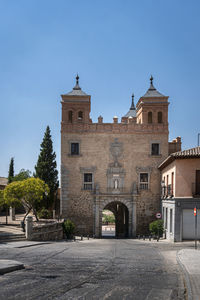 Ancient gateway in the city of toledo, spain