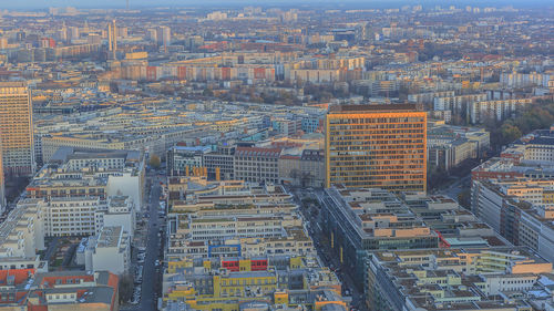 Aerial view of cityscape during sunset