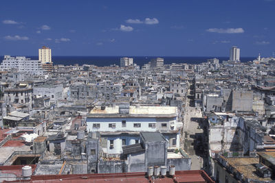 High angle view of buildings in city against sky