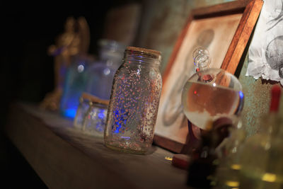 Close-up of drink in glass jar on table