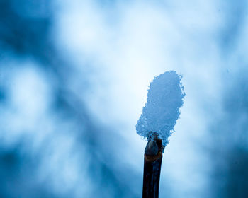 Smoke emitting from chimney on snow