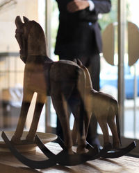 Rocking horses on table at home