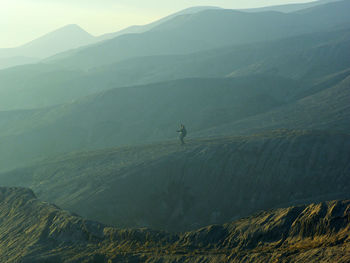 Scenic view of mountains during foggy weather