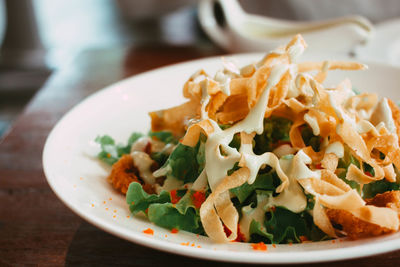 Close-up of food in plate on table