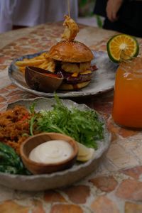 Close-up of burger in plate on table