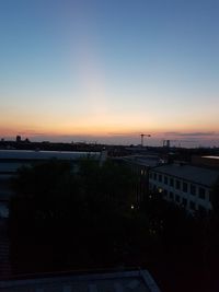 High angle view of cityscape against sky at sunset