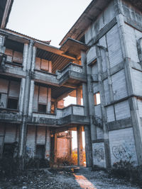 Low angle view of old building against sky