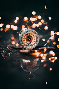 Close-up of illuminated lights at night