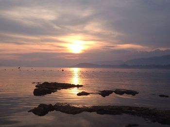 Scenic view of sea at sunset