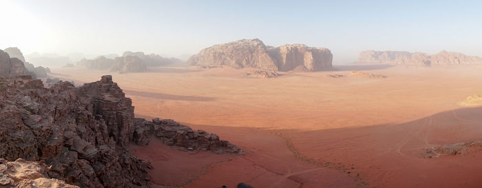 Panoramic view of desert against sky