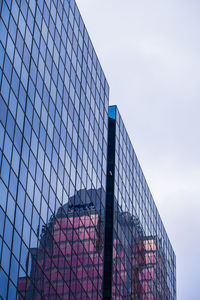 Low angle view of modern building against sky