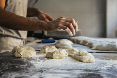 Man preparing food on table