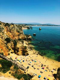 High angle view of beach against blue sky