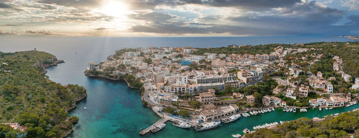 Aerial view of the porto colom fishing village in majorca.