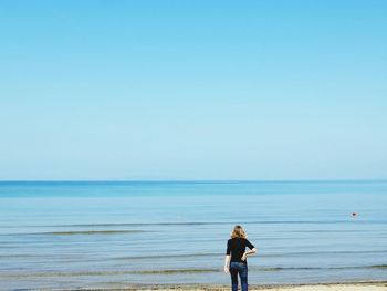 People standing on beach